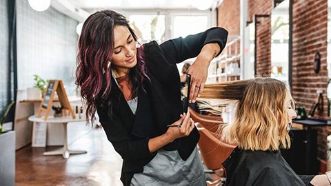 A small business owner in their shop