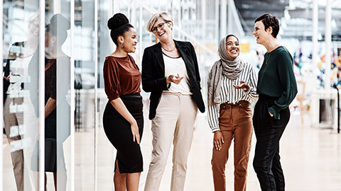 Diverse women talking happily