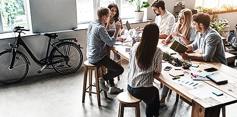 A group of employees interacting with each other