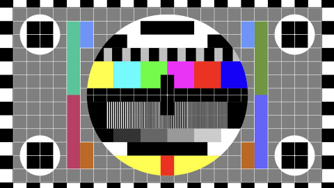 TV test card with rainbow multi color bars and geometric signals