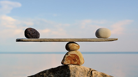 Pebbles balancing by the beach