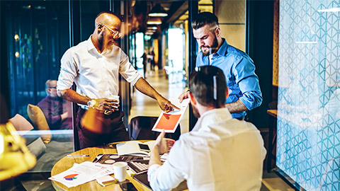 The accounts team conducting a meeting in the workplace