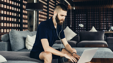 A bookkeeper comfortably working at home