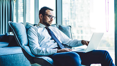 An accountant reviewing a client's tax summary on their behalf