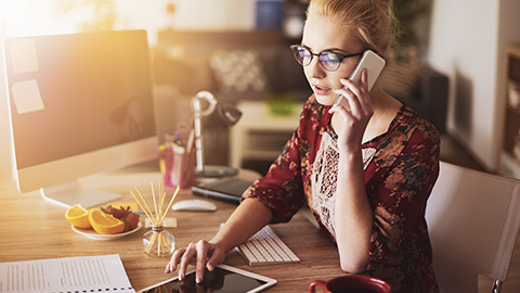 A small business owner contacting a client to chase up a payment