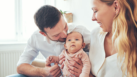 A close view of a family with baby