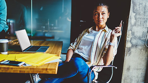 Businessperson in the process of rafting a complex document