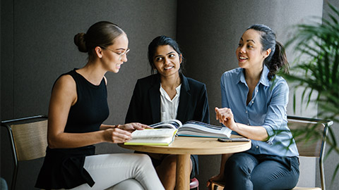 3 people having a relaxed conversation