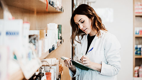 A person checking medical inventory