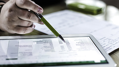 A person looking over the clinic's records