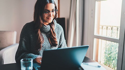 A young freelance designer working from her home office