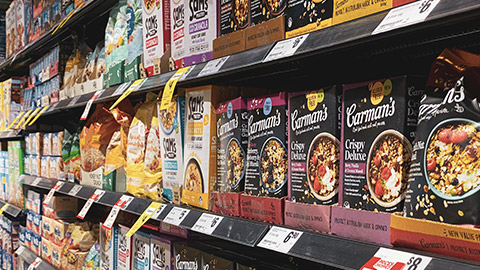 A close view of cereal choices in a supermarket