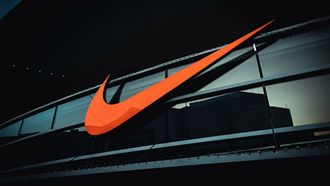 A nike sign on the outside of a building