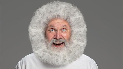 A elderly man with a spectacular beard/hair combo