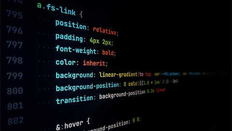 A close up of CSS code on a developers computer screen.