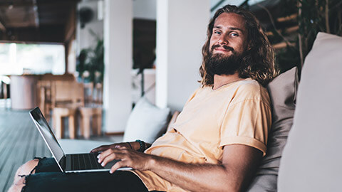 A young entrepreneur working on a project in a relaxed environment