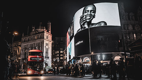 Advertising boards in London at night