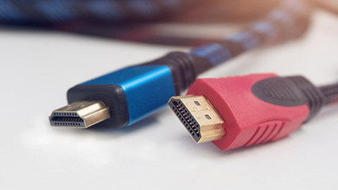 A close view of 2 HDMI cables