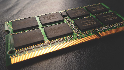 Computer RAM sitting on a leather surface