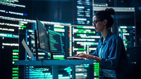 A person working on a computer in an office