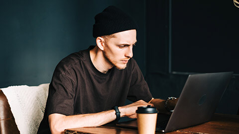 A prgrammer working on a laptop