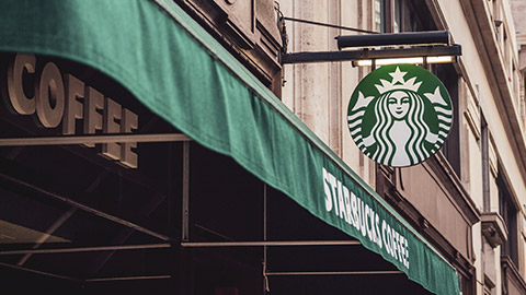 The exterior of a starbucks cafe