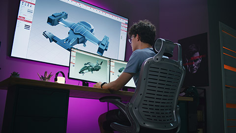 A designer working on a 3D model