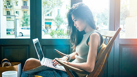 A designer working on a laptop