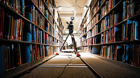 A video camera set up in a library