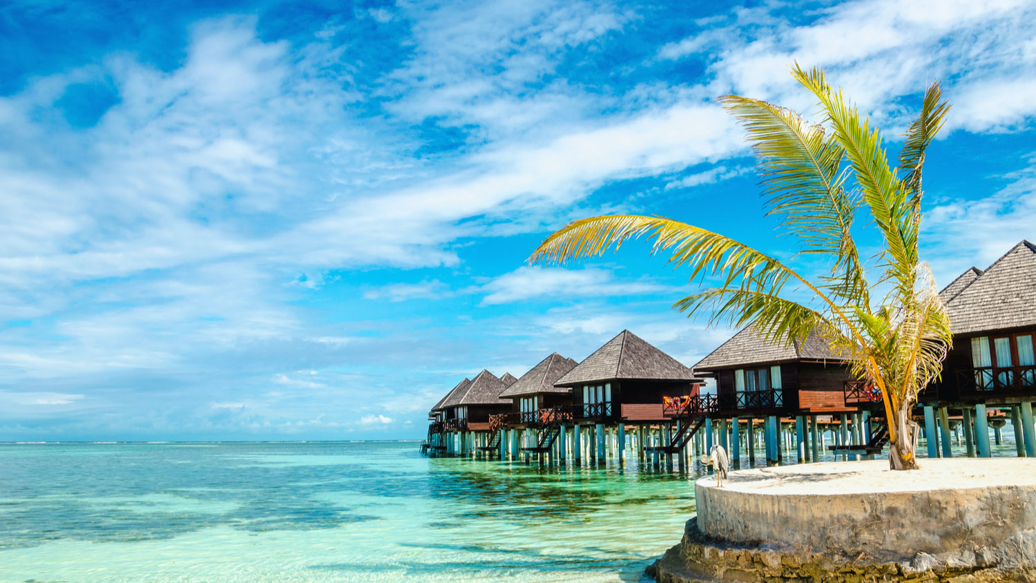 Exotic wooden huts on the water, Maldives