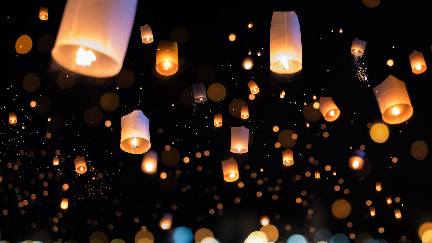 Loy krathong and Yi Peng Festival filled sky with lantern in Chiang Mai Thailand.