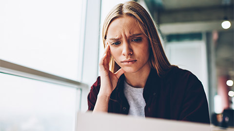 A woman stressed at work