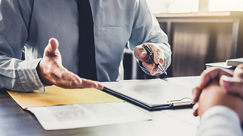 Lawyer explaining something to a client