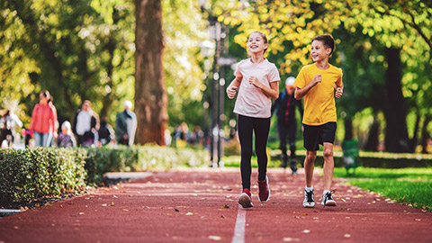 Adolescents running on a track