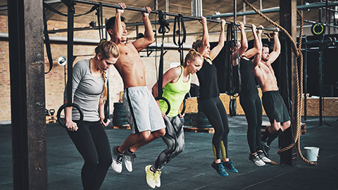 Group doing pullup variations