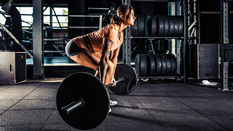 Person demonstrating dead lift exercise