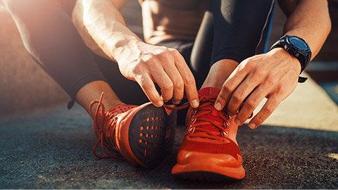 Male athlete preparing to run