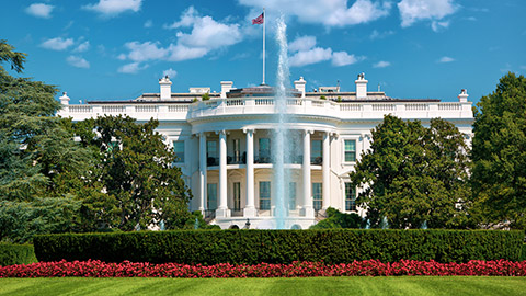 front view of white house on a sunny day