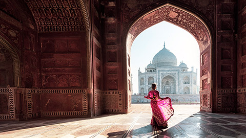 lady standing inside Taj Mahal doorway
