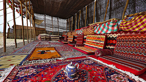 Colourful Bedouin tent in the desert