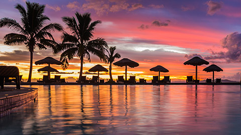 island holiday resort at sunset