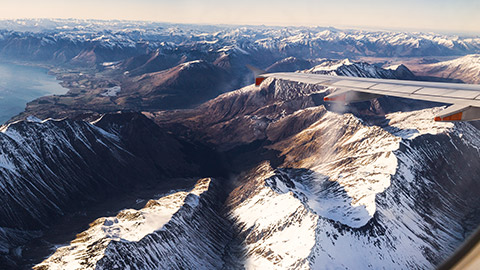 queenstown area as viewed from the window of a plane