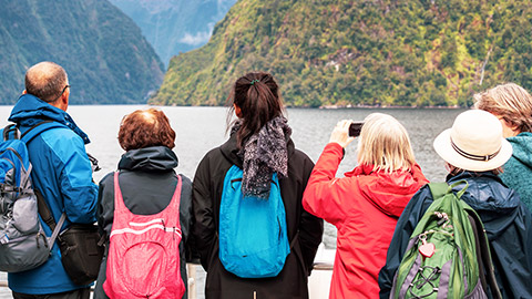 tourist group on boat enjoying the sites