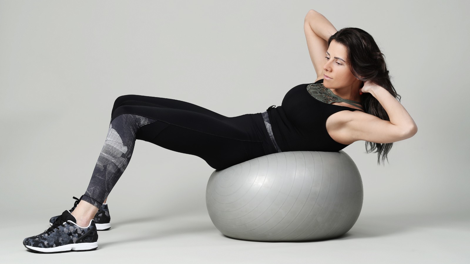 Woman using a fitness ball