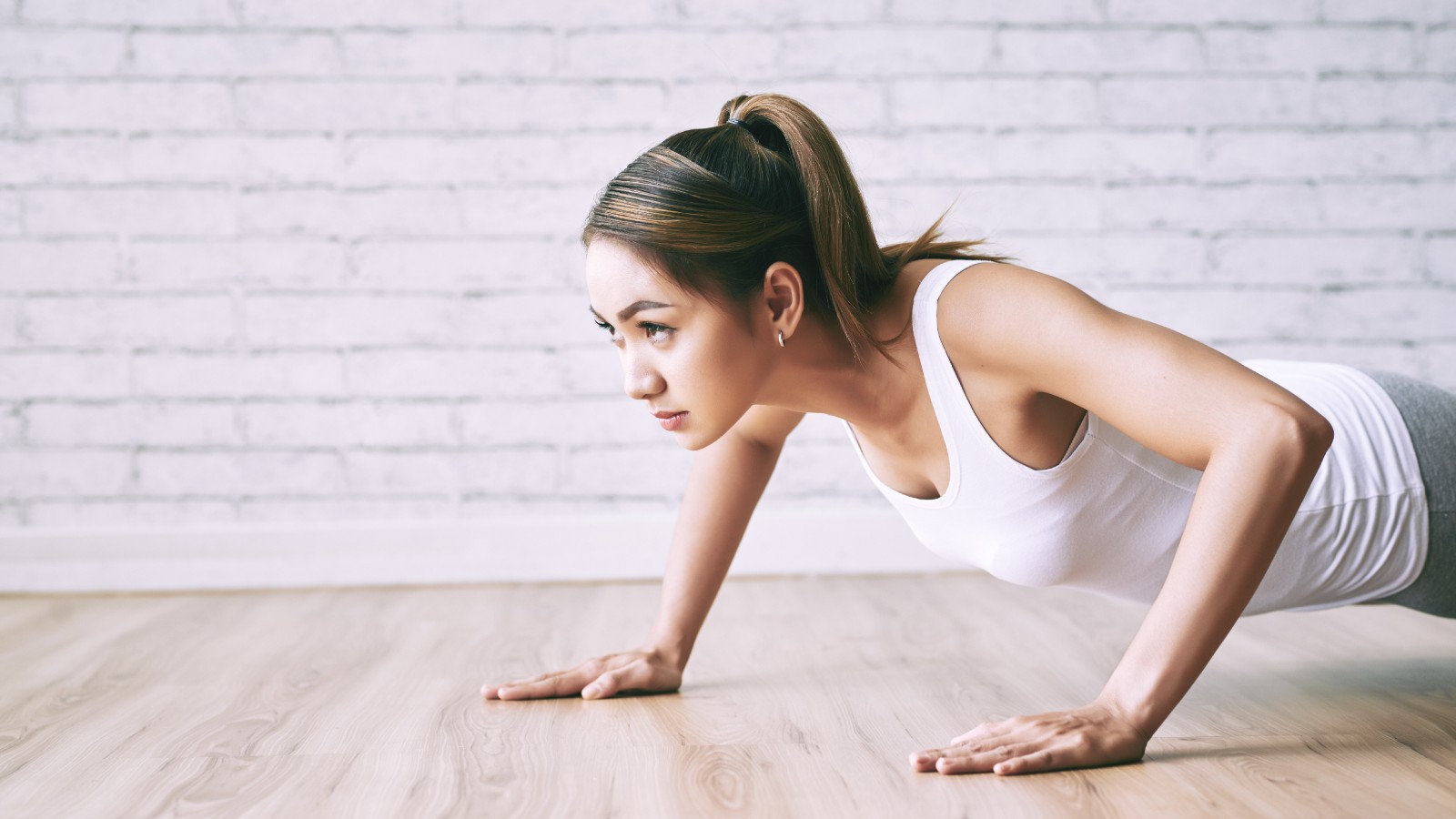 Woman doing push-ups during a fitness session