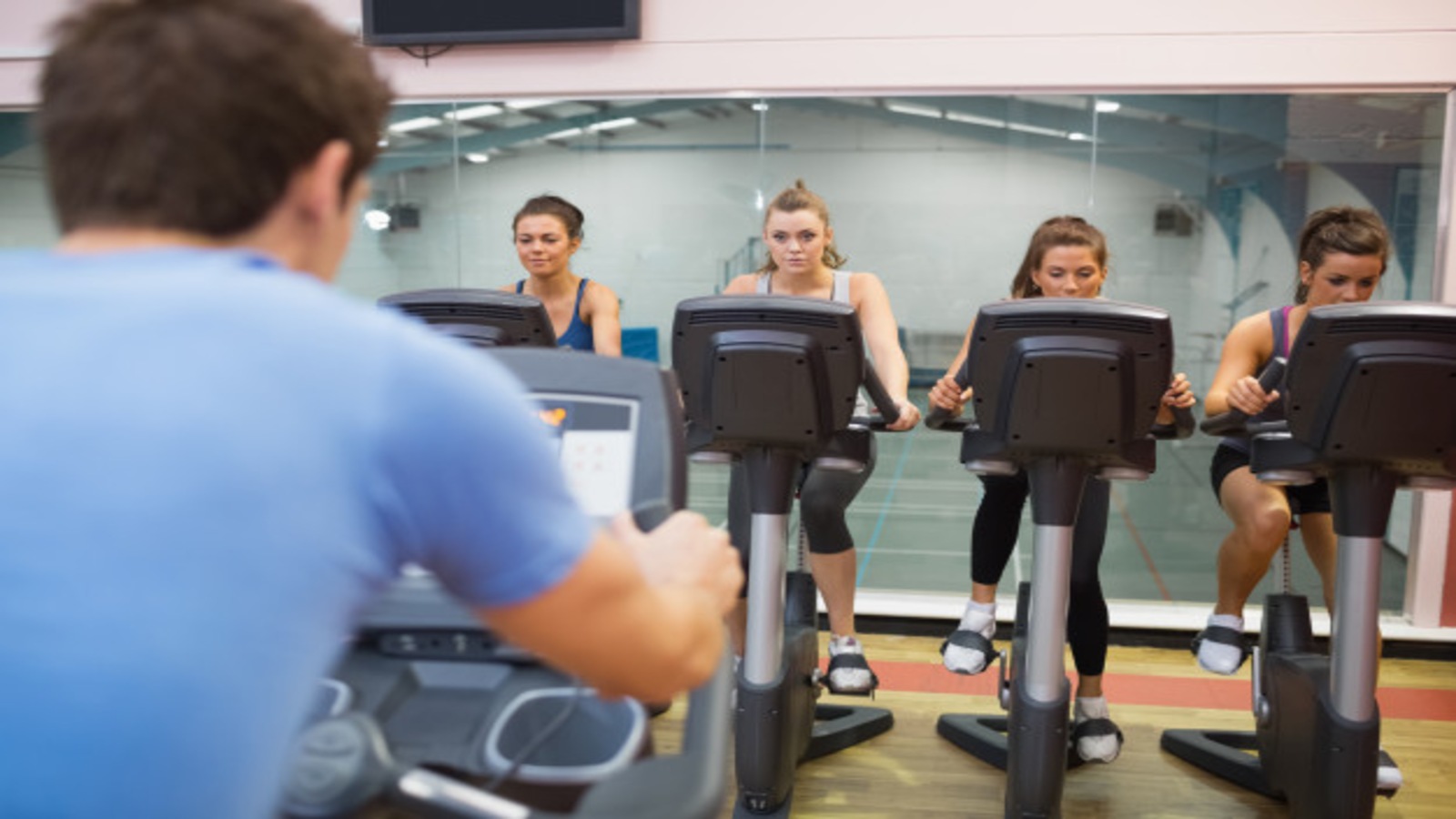 Instructing a spin class.