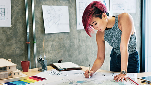 Female designer working at a desk