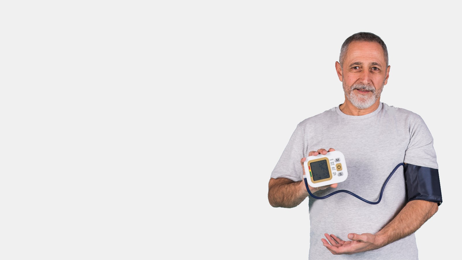 Man using a blood pressure monitor