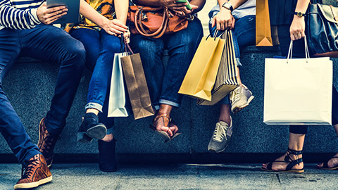 Grouup of shoppers with shopping bags