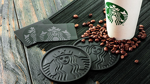 Starbucks coffee mug and beans